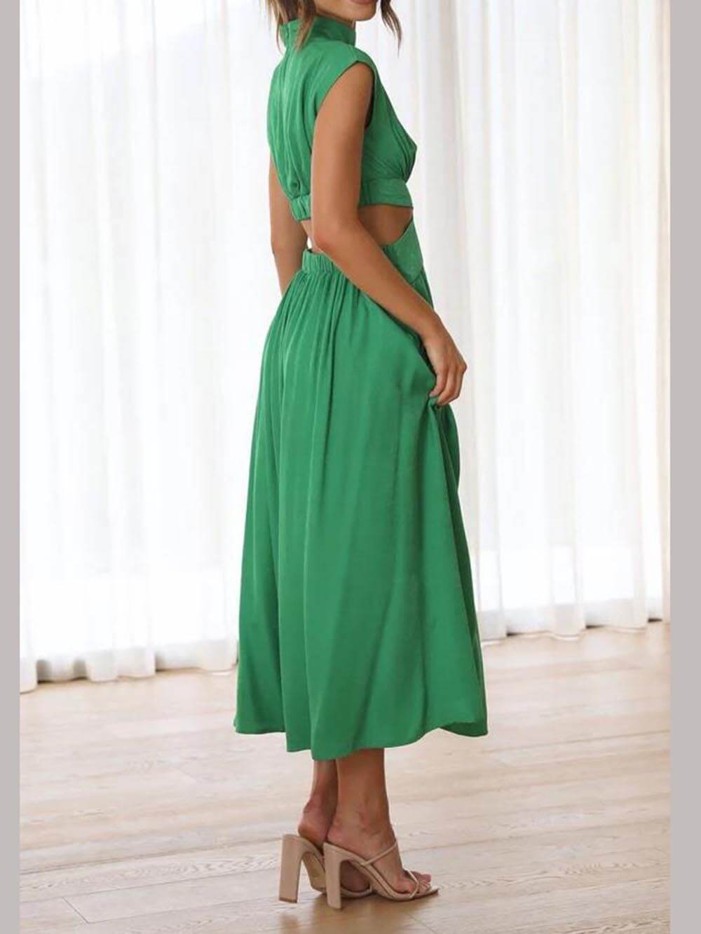 Holiday midi dress with cutout waist and pockets